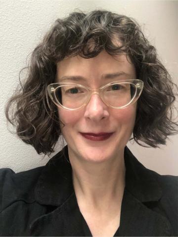 Headshot of Polly Abbott.